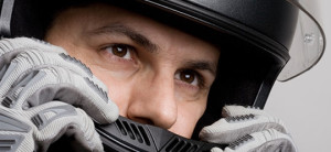 Close up of motorcyclist wearing a helmet. California motorcycle attorney Frank D. Penney gives tips on choosing the right helmet