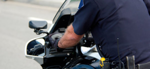 Close up of motorcycle law enforcement official on a motorcycle. California motorcycle attorney Frank D. Penney provides a list of motorcycle law resources